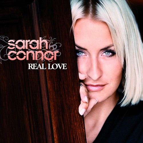 2010-Real-Love-Deluxe-Edition.jpg